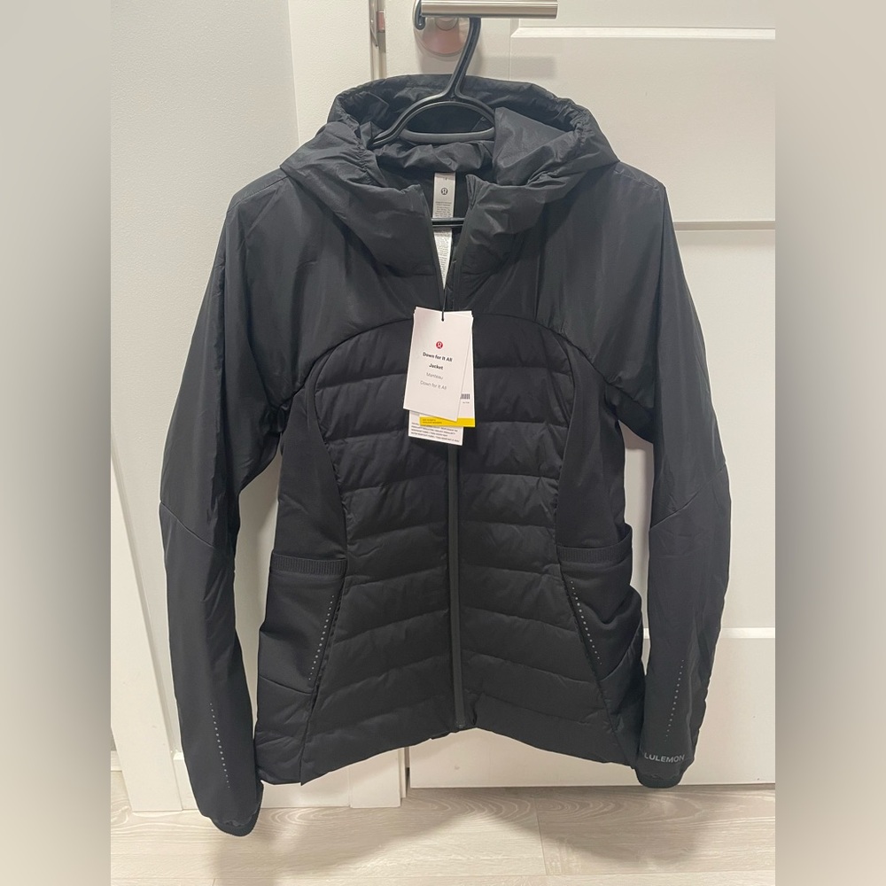Brand new never worn black Lululemon Down For It All jacket in women’s size 14